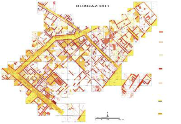 Burgaz 2011 yılına ait bir harita, sokak ve binaların kırmızı ve sarı tonlarıyla gösterildiği detaylı bir yerleşim planı.